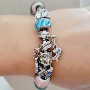 Iris by Joseph Nogucci murano charm bracelet